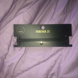 Black tattoo choker with gold charm